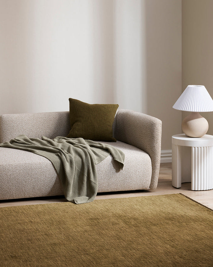Sandringham Floor Rug Create a sophisticated sanctuary with the dense, sumptuous pile of the Sandringham. Soft and supportive underfoot, this floor rug is handknotted from 100% wool, featuring a cut pile and delicate fringing at both ends. The neutral fog