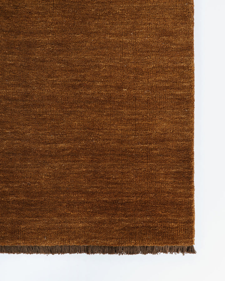 Sandringham Floor Rug Create a sophisticated sanctuary with the dense, sumptuous pile of the Sandringham. Soft and supportive underfoot, this floor rug is handknotted from 100% wool, featuring a cut pile and delicate fringing at both ends. The neutral fog