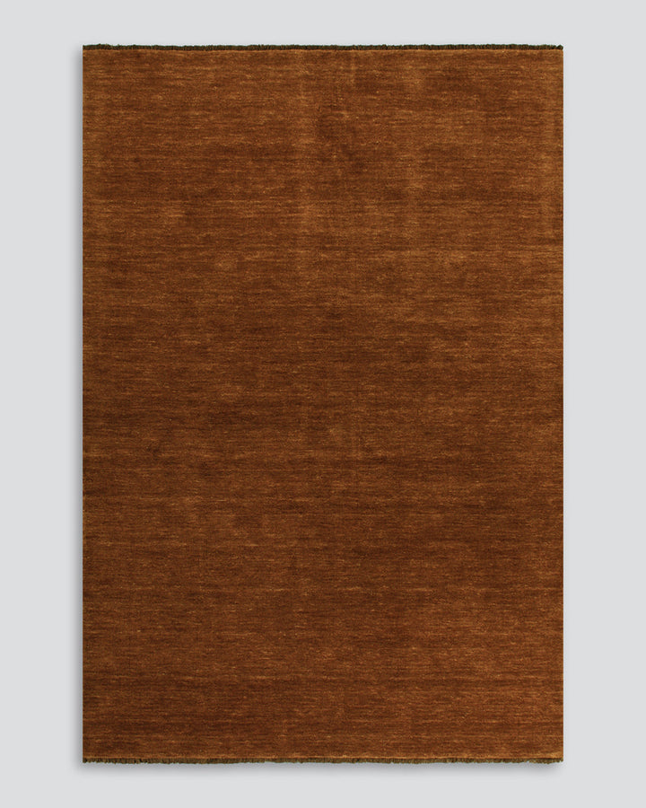 Sandringham Floor Rug Create a sophisticated sanctuary with the dense, sumptuous pile of the Sandringham. Soft and supportive underfoot, this floor rug is handknotted from 100% wool, featuring a cut pile and delicate fringing at both ends. The neutral fog