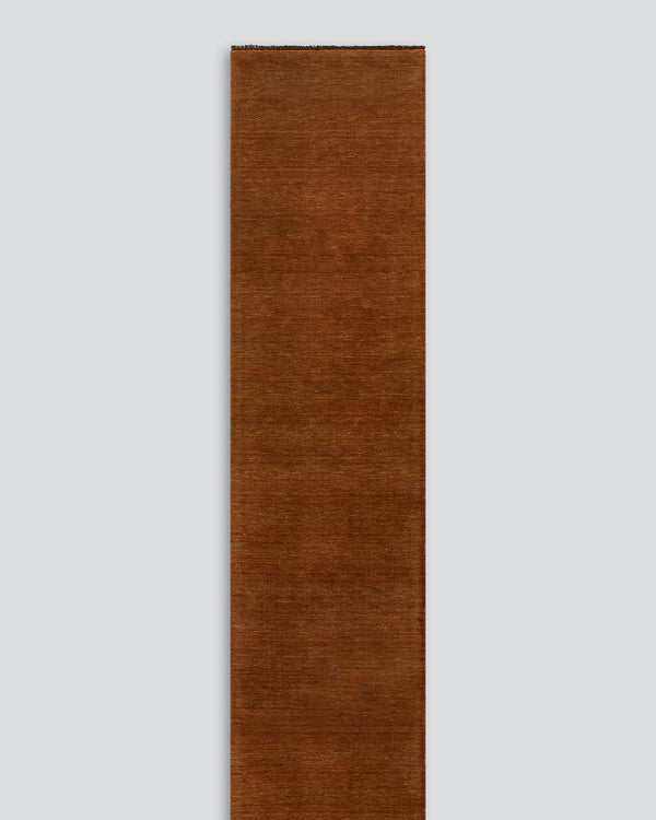 Sandringham Pecan Floor Runner Handcrafted from 100% wool, this warm-toned Sandringham runner is both functional and beautiful, offering an unparalleled softness underfoot, while imbuing your hallway with tone and personality. Baya