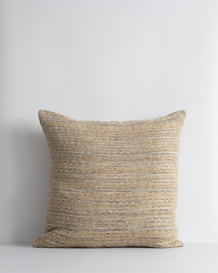 Sari Cushion Constructed from artisanal woven fabric, the Sari is handcrafted using a stunning blend of wild tussar silk and linen. Featuring a subtle pattern in earthy shades of biscuit, ecru and peat, the Sari adds an understated textural aesthetic to a