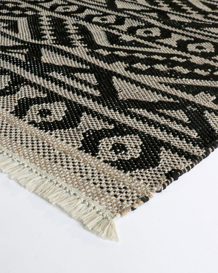 Sifiso Floor Rug Handwoven from durable polypropylene, the Sifiso outdoor rug is finished with a relaxed, hand-knotted fringe edging. Soft underfoot, the ethnic-inspired design looks stunning on any surface and can be used in and outdoors interchangeably.