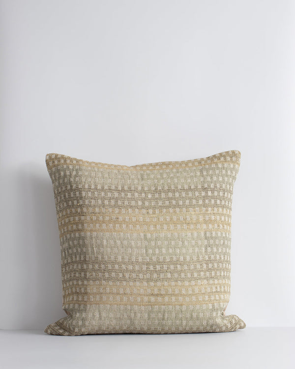 Solano Cushion Celebrating the beauty of artisanal woven fabric, Solano is an exquisite textural piece in shades of muted sage, grey and putty. Handwoven in a silk-linen blend, the delicate surface pattern creates an inviting and serene aesthetic. Pair wi