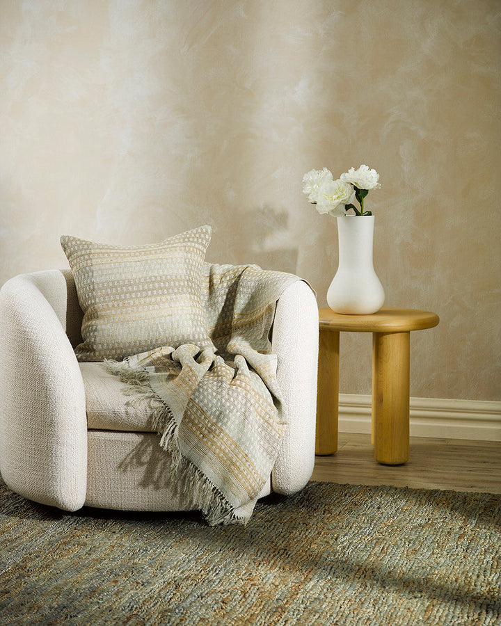 Solano Cushion Celebrating the beauty of artisanal woven fabric, Solano is an exquisite textural piece in shades of muted sage, grey and putty. Handwoven in a silk-linen blend, the delicate surface pattern creates an inviting and serene aesthetic. Pair wi