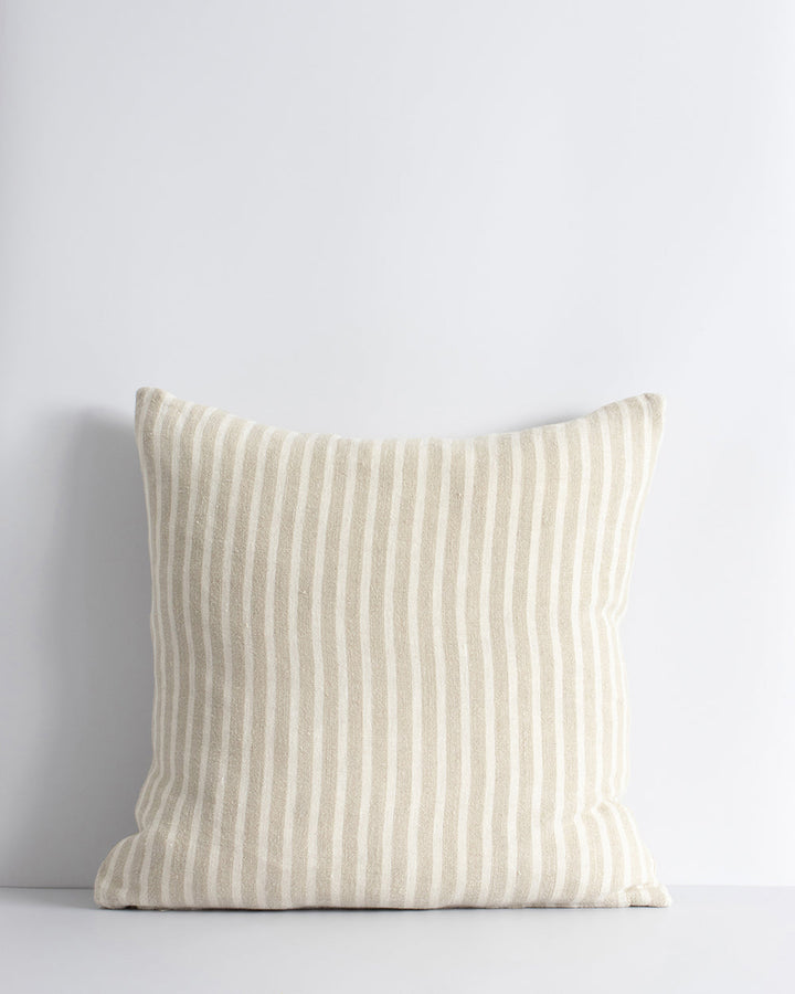 Spencer Cushion The essence of understated elegance is celebrated with the classic Bengal stripe design of the Spencer. Handwoven by skilled artisans, the medium-weight fabric embracesÂ the natural beauty of linen fibres, instilling an earthy, organic fee