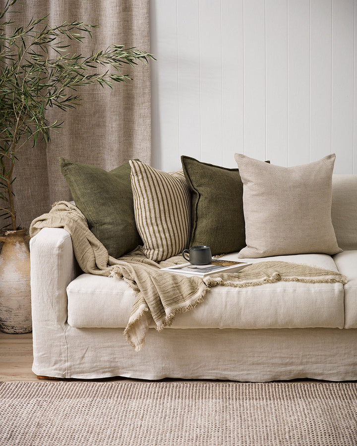 Spencer Cushion The essence of understated elegance is celebrated with the classic Bengal stripe design of the Spencer. Handwoven by skilled artisans, the medium-weight fabric embracesÂ the natural beauty of linen fibres, instilling an earthy, organic fee