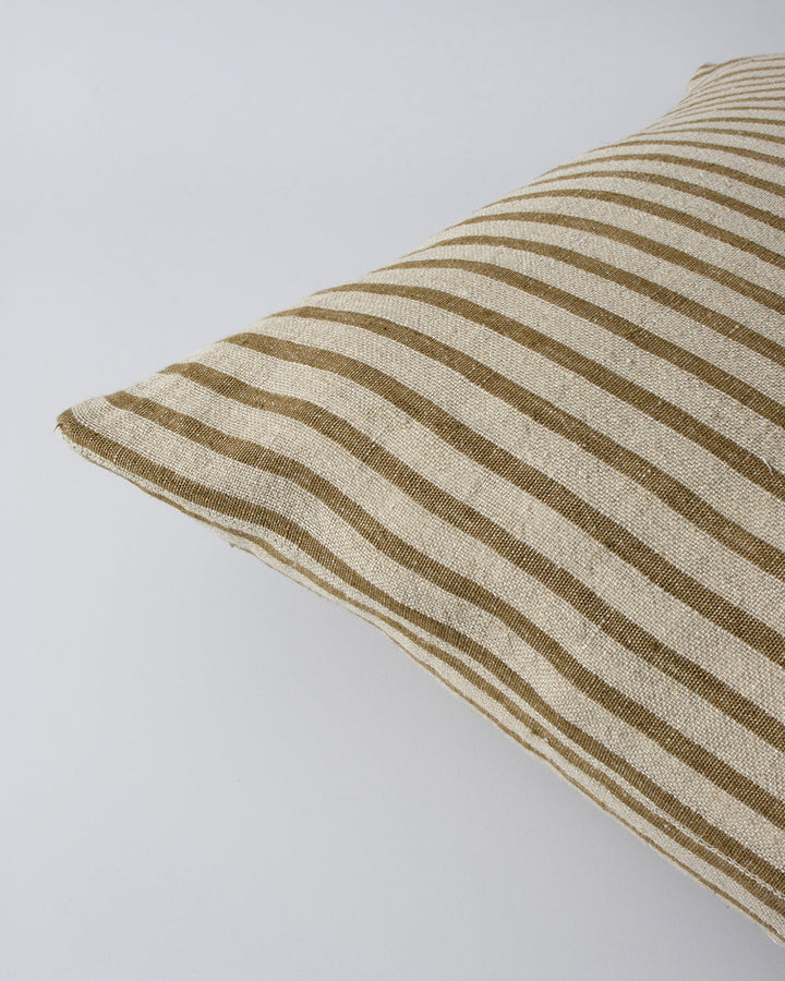 Spencer Cushion The essence of understated elegance is celebrated with the classic Bengal stripe design of the Spencer. Handwoven by skilled artisans, the medium-weight fabric embracesÂ the natural beauty of linen fibres, instilling an earthy, organic fee