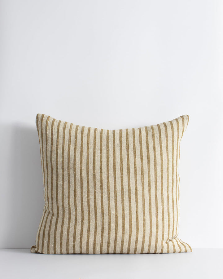 Spencer Cushion The essence of understated elegance is celebrated with the classic Bengal stripe design of the Spencer. Handwoven by skilled artisans, the medium-weight fabric embracesÂ the natural beauty of linen fibres, instilling an earthy, organic fee