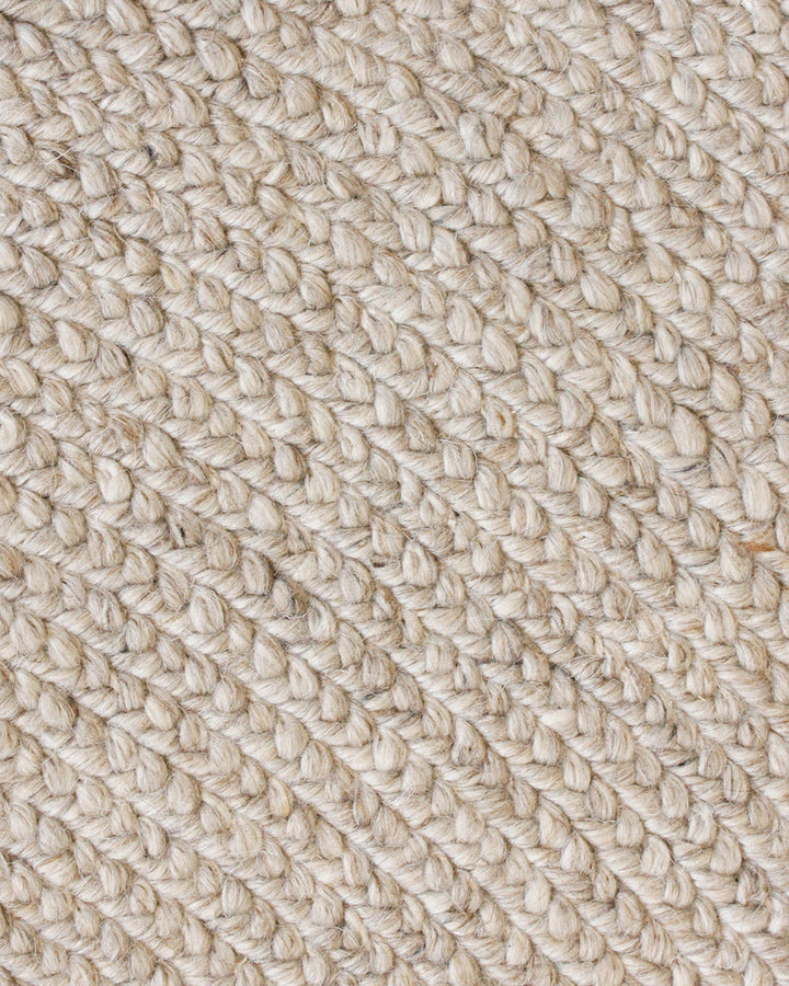 Tairua Floor Rug Anchor key furniture pieces or make the most of smaller spaces with this contemporary braided design. Understated and inviting, the subtly mottled yarn provides a neutral base around which to style a timeless interior. Australian Stock Bu