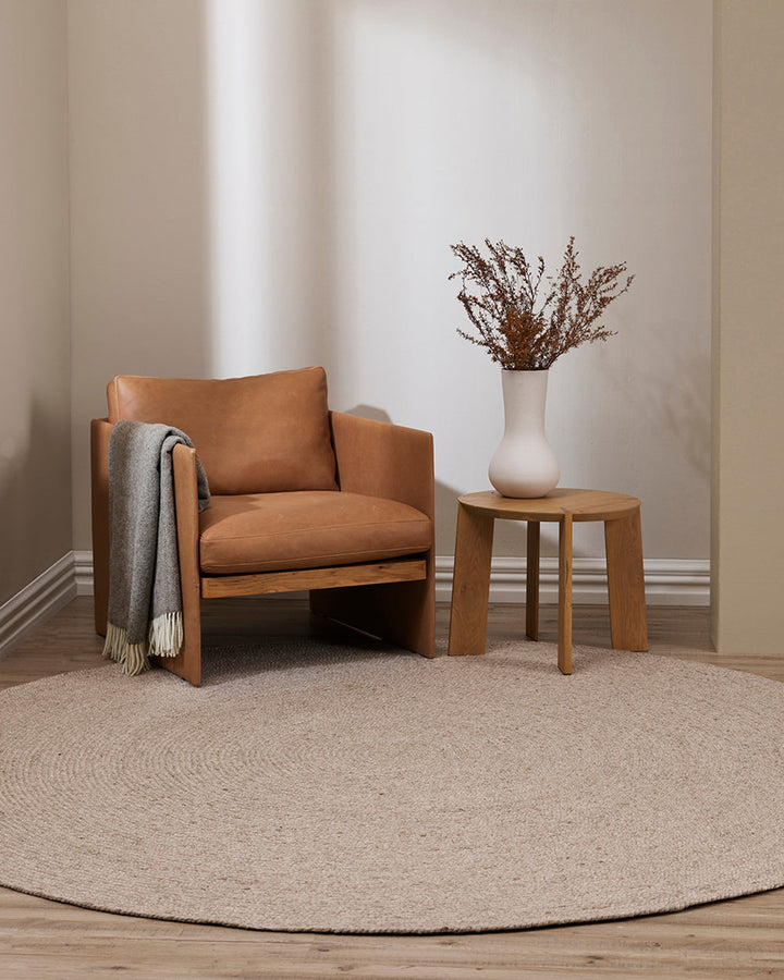 Tairua Floor Rug Anchor key furniture pieces or make the most of smaller spaces with this contemporary braided design. Understated and inviting, the subtly mottled yarn provides a neutral base around which to style a timeless interior. Australian Stock Bu