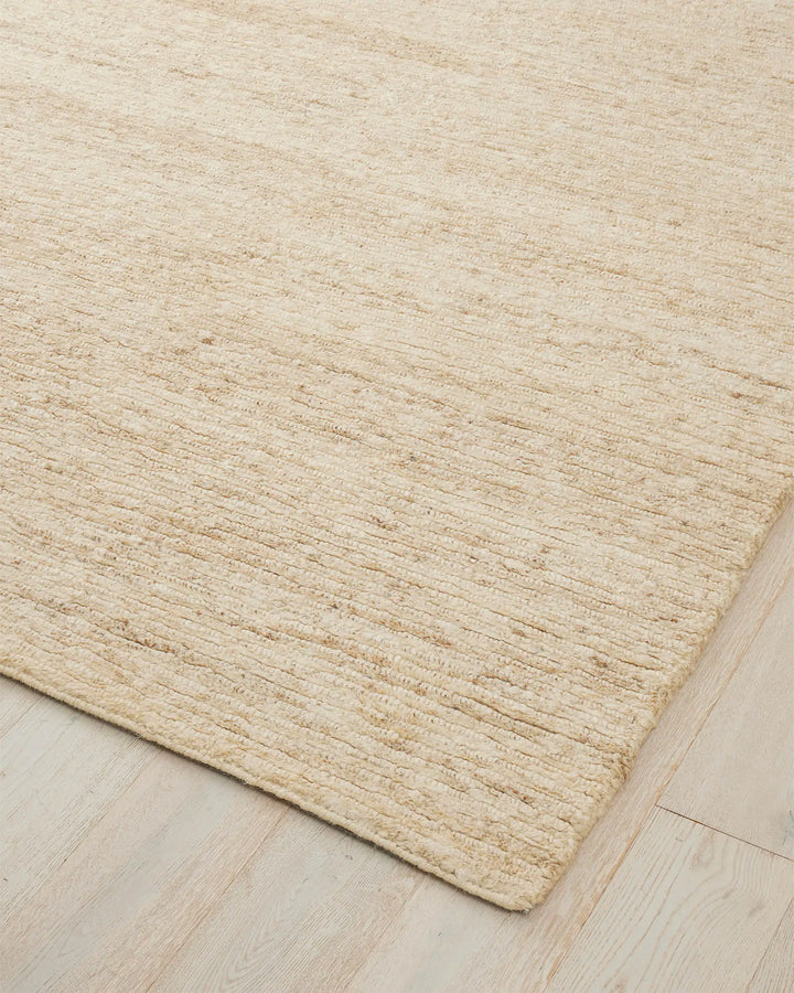 Bastian Macadamia - Natural Jute Rug Discover the Bastian Macadamia rug, crafted from 100% jute for durability and style, featuring a unique textured design.