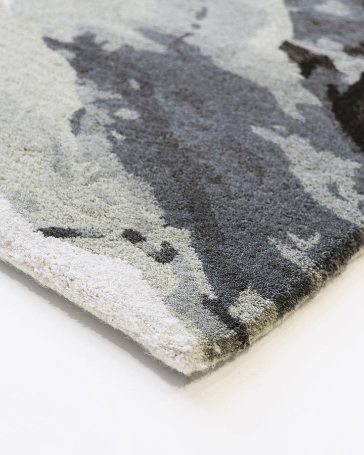 Uluru Floor Rug Inspired by aerial photography and geological layering, the Uluru is a stunning focal point to style your room around. Handtufted in a soft wool-viscose blend, the muted tones of ivory, sage, grey and ochre are easily paired with complemen