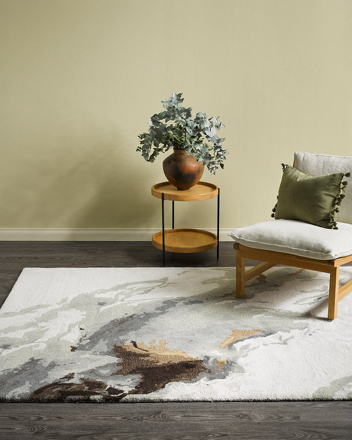 Uluru Floor Rug Inspired by aerial photography and geological layering, the Uluru is a stunning focal point to style your room around. Handtufted in a soft wool-viscose blend, the muted tones of ivory, sage, grey and ochre are easily paired with complemen