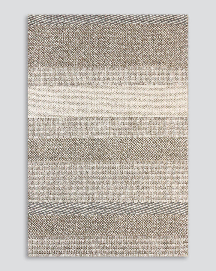 Valley Floor Rug Inspired by dry landscapes and the stony riverbeds of Southland, the Valleyâ€™s design features a range of different weaving techniques in a beautiful wool and cotton blend. Tones of muted blue, ivory and taupe harmonise to create a relax