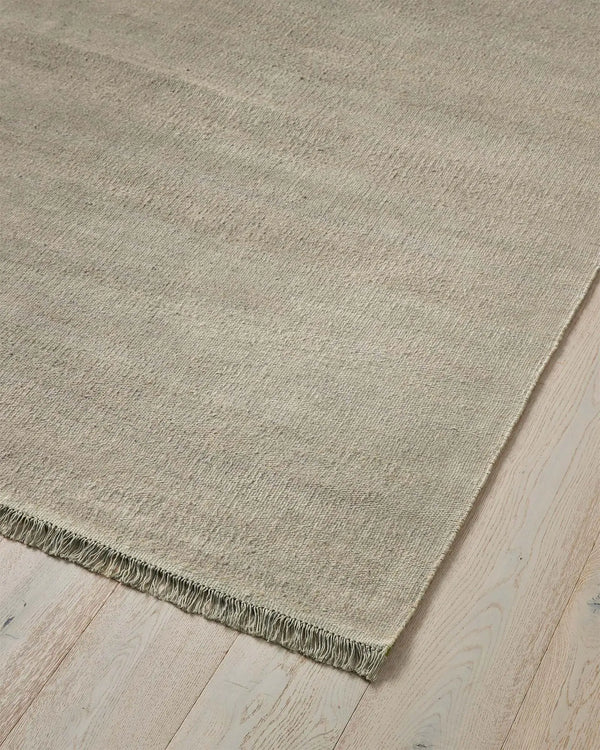 Emilio Oyster - Premium Linen Rug for Modern Homes Elevate your space with Emilio Oyster, a sophisticated flat-weave rug crafted from 100% linen, offering timeless charm and warmth.