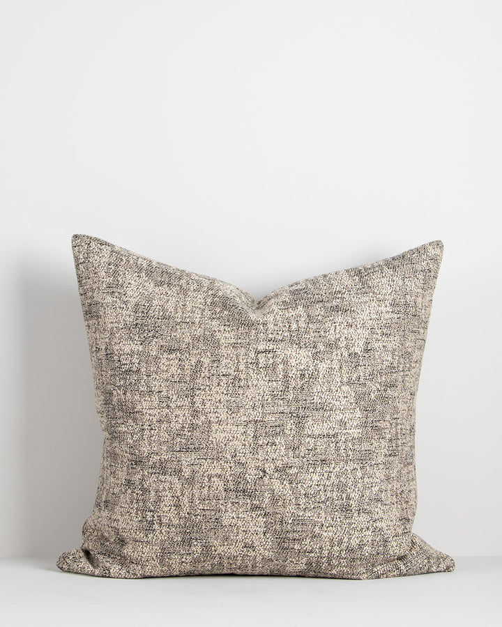 Vincent Cushion Intricately woven, a mottled, textured effect is achieved through the varied use of colour and yarn weights. A subtle viscose lustre conveys an understated, luxury aesthetic. Australian Stock Buy at beon.com.au