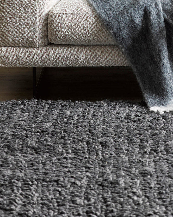 Wanaka Floor Rug Add texture and depth to a room with the beauty of our Wanaka floor rug. A felted blend of New Zealand wool is carefully crafted into a cut and loop pile to create a distinctive surface and luxurious underfoot feel. The rich texture and t