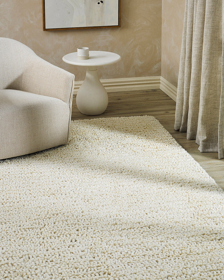 Wanaka Floor Rug Add texture and depth to a room with the beauty of our Wanaka floor rug. A felted blend of New Zealand wool is carefully crafted into a cut and loop pile to create a distinctive surface and luxurious underfoot feel. The rich texture and t