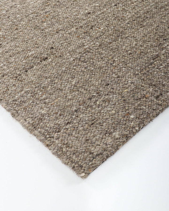 Wichita Floor Rug Add subtle texture to your space with the simplicity of pure wool. Handwoven by skilled artisans, the undyed ecru tone and tight slubby weave construction of the Wichita creates warmth and depth for contemporary living. Australian Stock