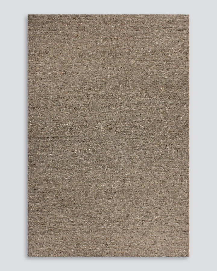 Wichita Floor Rug Add subtle texture to your space with the simplicity of pure wool. Handwoven by skilled artisans, the undyed ecru tone and tight slubby weave construction of the Wichita creates warmth and depth for contemporary living. Australian Stock