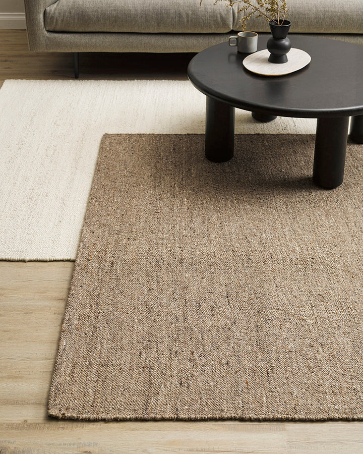 Wichita Floor Rug Add subtle texture to your space with the simplicity of pure wool. Handwoven by skilled artisans, the undyed ecru tone and tight slubby weave construction of the Wichita creates warmth and depth for contemporary living. Australian Stock