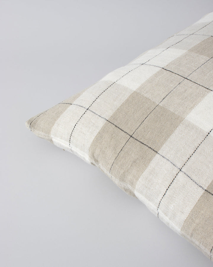 Willis Cushion Country charm is reinterpreted for urban living with Willis â€“ a relaxed, handwoven plaid design. In a modern twist, traditional fabric is re-imagined in a rich tobacco tone that is both elegant and understated. Pair with tones in compleme