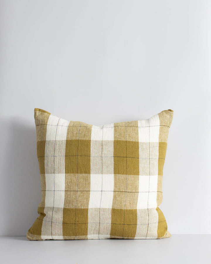 Willis Cushion Country charm is reinterpreted for urban living with Willis â€“ a relaxed, handwoven plaid design. In a modern twist, traditional fabric is re-imagined in a rich tobacco tone that is both elegant and understated. Pair with tones in compleme