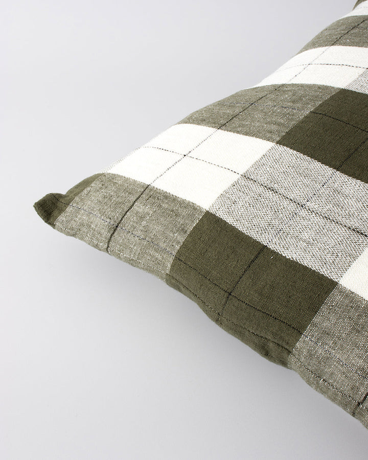 Willis Cushion Country charm is reinterpreted for urban living with Willis â€“ a relaxed, handwoven plaid design. In a modern twist, traditional fabric is re-imagined in a rich tobacco tone that is both elegant and understated. Pair with tones in compleme