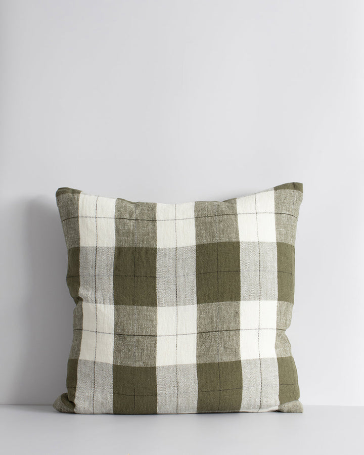 Willis Cushion Country charm is reinterpreted for urban living with Willis â€“ a relaxed, handwoven plaid design. In a modern twist, traditional fabric is re-imagined in a rich tobacco tone that is both elegant and understated. Pair with tones in compleme