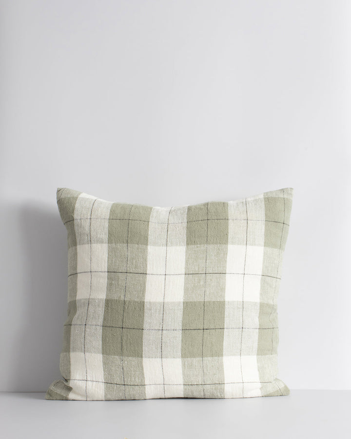 Willis Cushion Country charm is reinterpreted for urban living with Willis â€“ a relaxed, handwoven plaid design. In a modern twist, traditional fabric is re-imagined in a rich tobacco tone that is both elegant and understated. Pair with tones in compleme