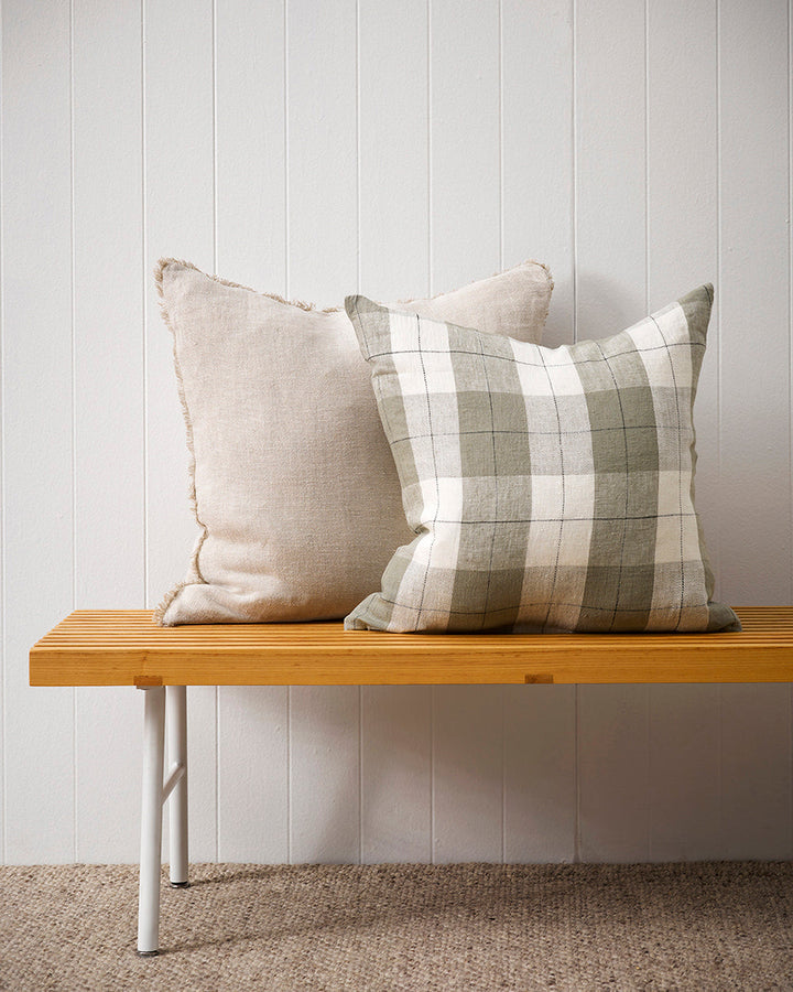 Willis Cushion Country charm is reinterpreted for urban living with Willis â€“ a relaxed, handwoven plaid design. In a modern twist, traditional fabric is re-imagined in a rich tobacco tone that is both elegant and understated. Pair with tones in compleme