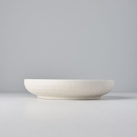 Save on Recycled White High Rim Plate Made in Japan at BEON. 22cm diameter x 4.5cm heightHigh Rim Plate in Recycled White design. Our Recycled White ceramic range is created from used & broken tableware from over 30 local kilns. Once crushed up to 50% of the material is mixed with new clay which enables the firing temperature to be lower which in turn reduces fuel consumption at the kiln. These tableware pieces are of the same high quality seen across our other ranges. Handmade in Japan. Microwave and dishw