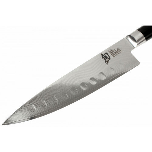 Buy online & save Shun Classic Chefs Knife Granton Edge 20cm |Shun |BEON.COM.AU With its keen edge and gorgeous design, the handcrafted Japanese Shun Classic collection is both a long time favourite of homecooks and professional chefs alike. Each knife in this collection features Shun's high proprietary VG-Max steel core that provides its Damascus clad steel optimum edge... Shun at BEON.COM.AU
