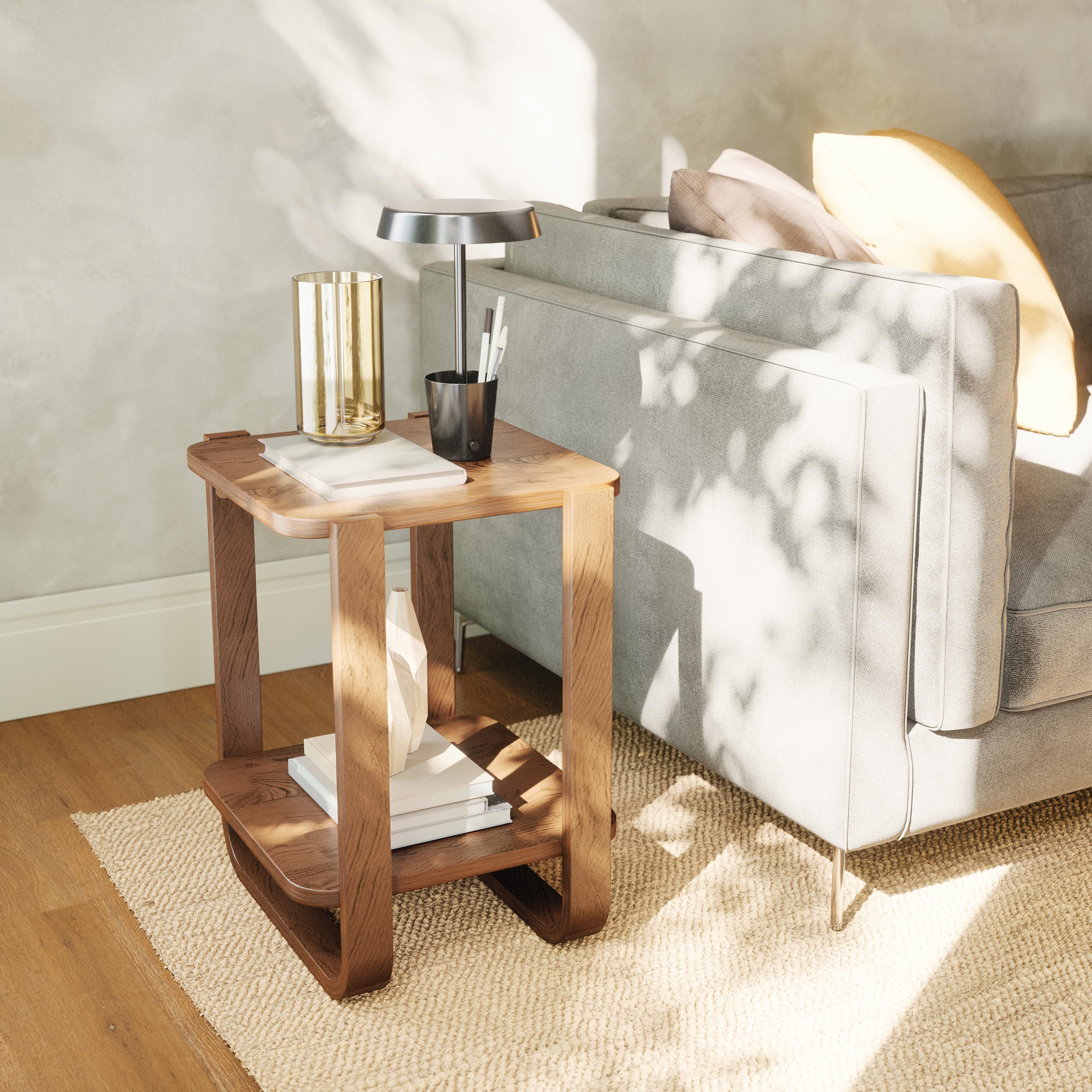 Aged Walnut Bellwood Side Table By Umbra Bellwood features soft bent-wood legs and two open tiers, bringing a warm, airy atmosphere to any living room, bedroom or entryway. This multi-purpose side table boasts ample storage capacity, supporting 90.7 kg an