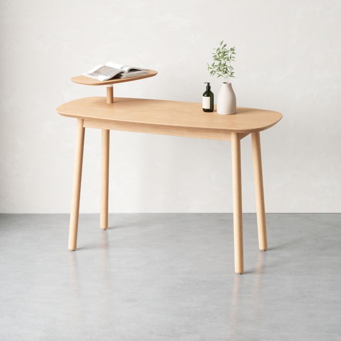 Umbra Swivo Desk In Natural A minimalist and natural-finish desk, Swivo features a swivelling top tier, providing space for a small plant, books, drinks and more.Incorporating real wood and soft curves, this desk adds a subtle modern touch to your work sp