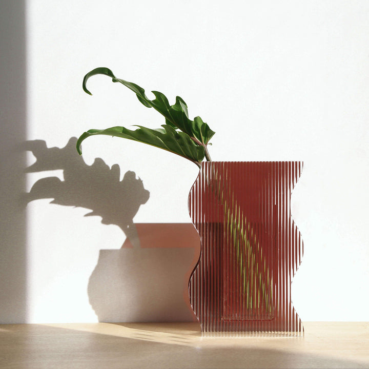 Wave Vase Vases Available at BEON | The Vase Collection combines the classic elegance of a vintage ribbed glass vase with a modern, light expression. This collection takes inspiration from simple and minimal geometric shapes, and is available in Arch, Wav