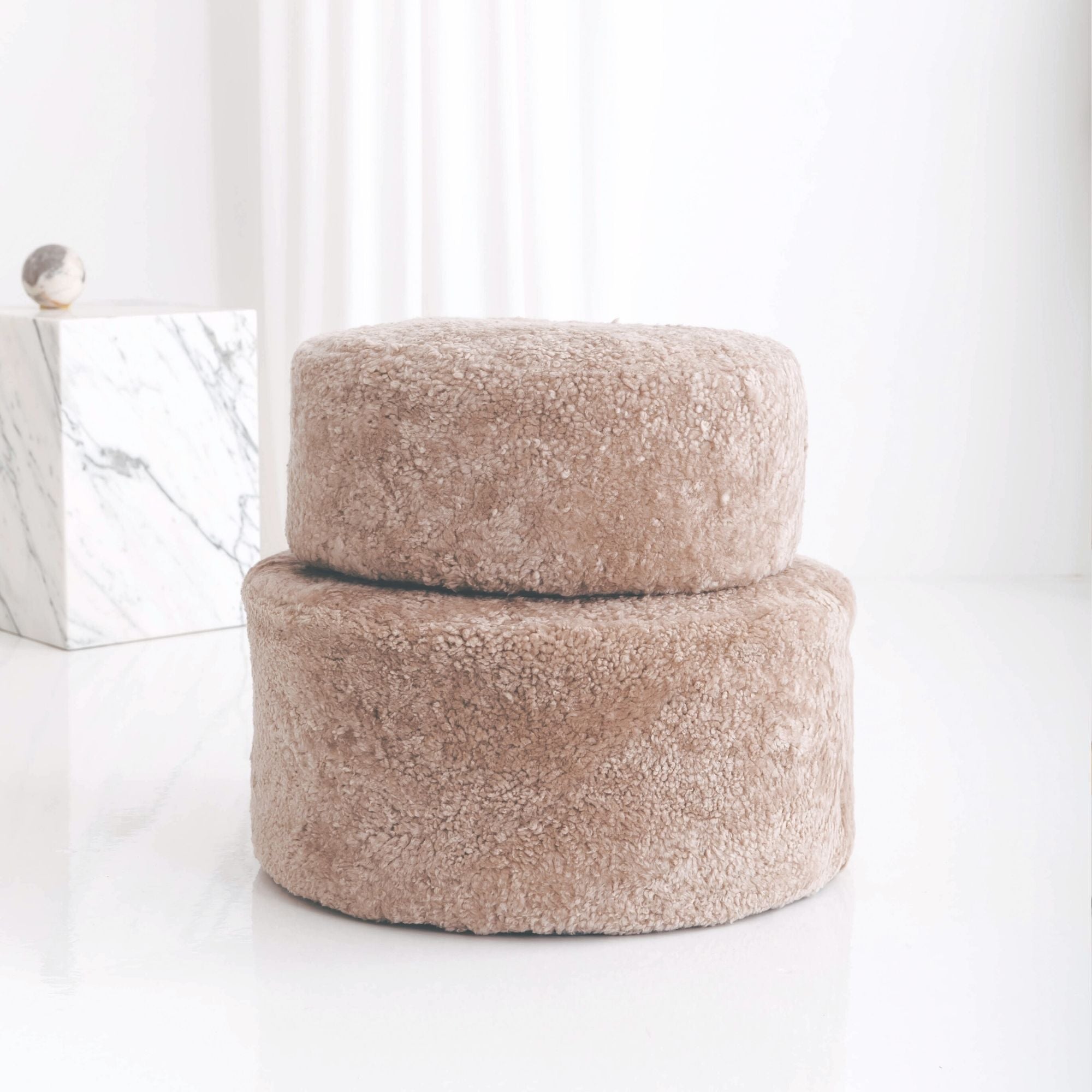 Bring natural texture and contemporary design into your space with the sturdy and stylish handmade Jamieson Round Ottoman. Choose between two sizes and three beautiful modern colours, or mix-and-match