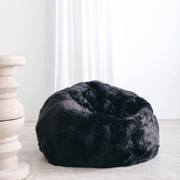 Buy and Save on The Byron Beanbag Chair Bean Bag Chairs | Fall into the comfort of a beautifully designed giant luxury sheepskin beanbag chair, handmade from the finest ethically sourced, super soft long wool sheepskin. Each of our over sized Byron Beanba