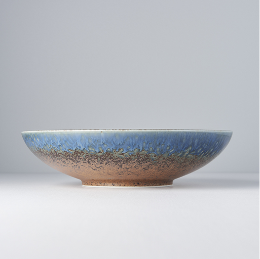 Save on Earth & Sky Open Serving Bowl Made in Japan at BEON. 28cm diameter x 7.5 height Open shape serving bowl in Earth & Sky Design The Earth & Sky range features a hand-dipped edge of bold ink-blue contrasted with a speckled tawny brown. Great piece for table centrepiece, or as a main focus of a buffet style meal serving salads and pasta. Top selling bowl that makes a great gift.Handcrafted in JapanMicrowave and Dishwasher safe