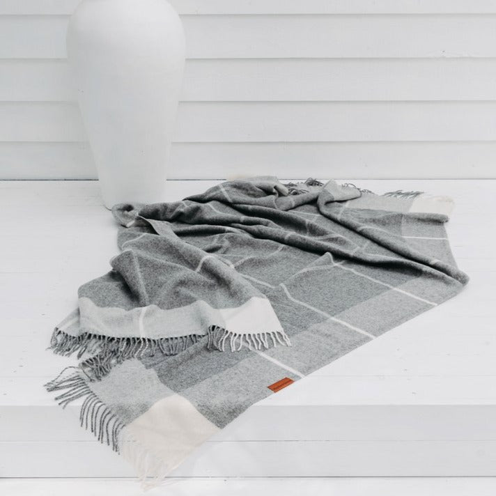 Buy Ascot Merino Wool Throw - Grey | Throws |The Ascot 100% Merino Wool Throw in Grey has been hand loomed in Lithuania from the finest Merino Wool sourced from the rolling hills of Australia &amp; New Zealand. Naturally soft and over sized, The Ascot Merino Wool Throw has a classic large plaid design with a modern minimalist twist. Ava... by Huxford Grove at BEON.COM.AU