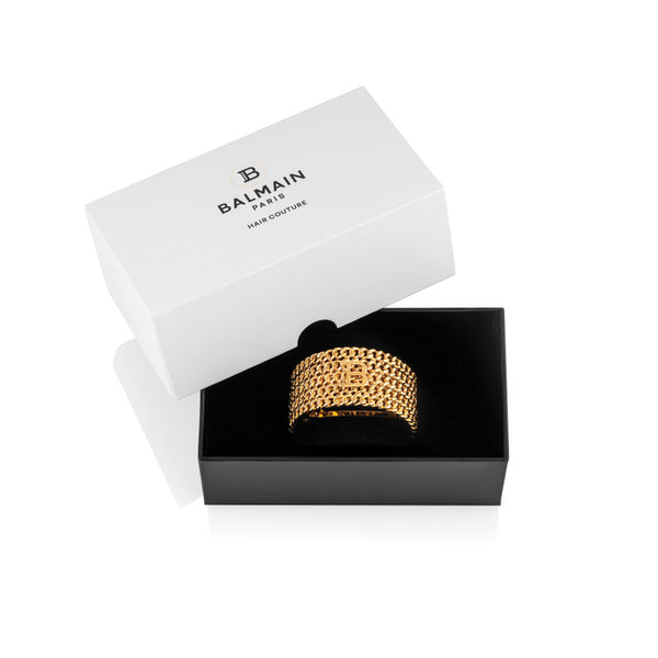 Balmain Limited Edition Large Golden Chain Clip Fw22 Limited edition hair accessory inspired by the love locks of the Parisian "Pont des Arts" bridge. The 18K gold plated hair clip perfectly spreads the hair to create a full-bodied iconic Balmain ponytail