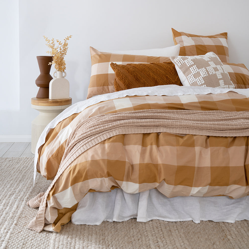 BEON.COM.AU Our Maybank Quilt Cover Sets are made from a soft cotton fabric that has been woven into a large yarn-dyed check pattern. The beautiful rust, cream and soft peach tones of the check are sure to warm up your room this season, adding a sense of on-trend and classic sophistication. Maybank is backed... at BEON.COM.AU