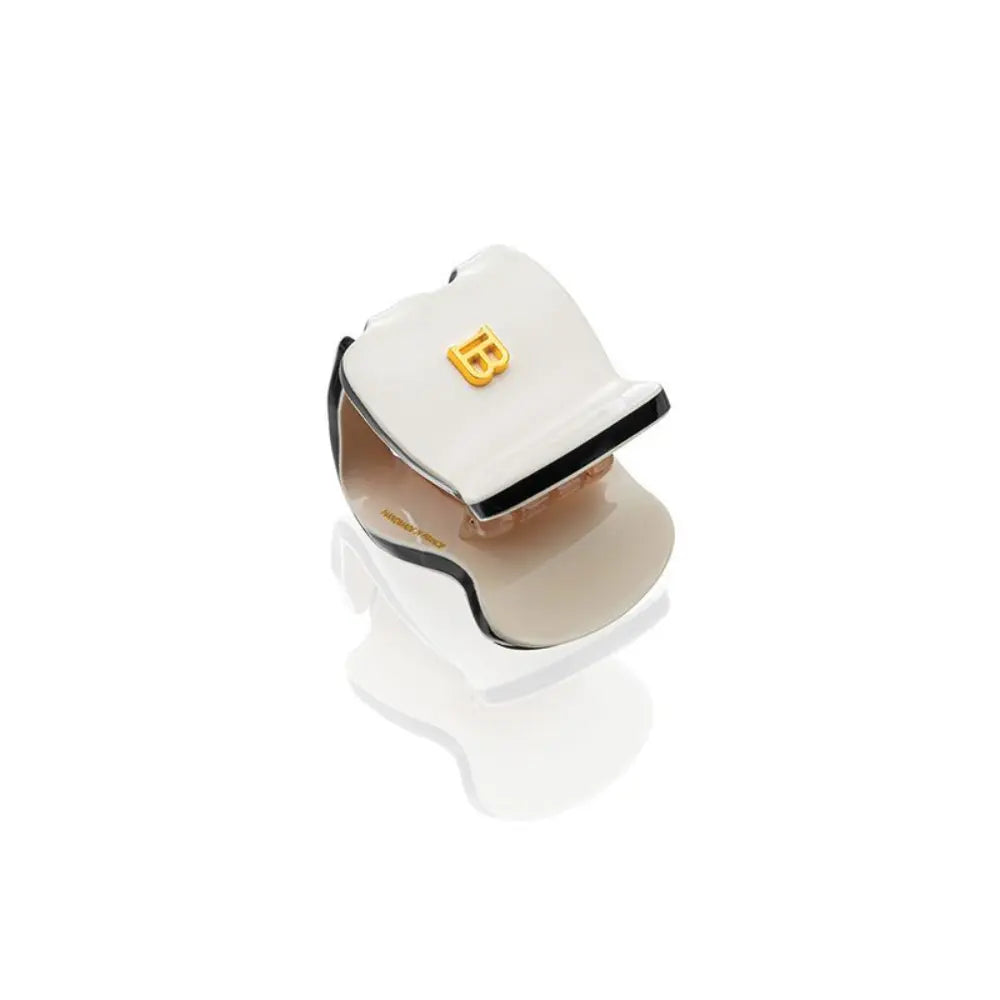 Buy Balmain Hair Pinch Clip Extra Small / Ivory & Black / Limited Edition SS23 Hair Clips Elevate your hair style with the timeless beauty of the Balmain Hair Pinch Clip Extra Small from the Limited Edition SS23 collection. The sophisticated Black & Ivory