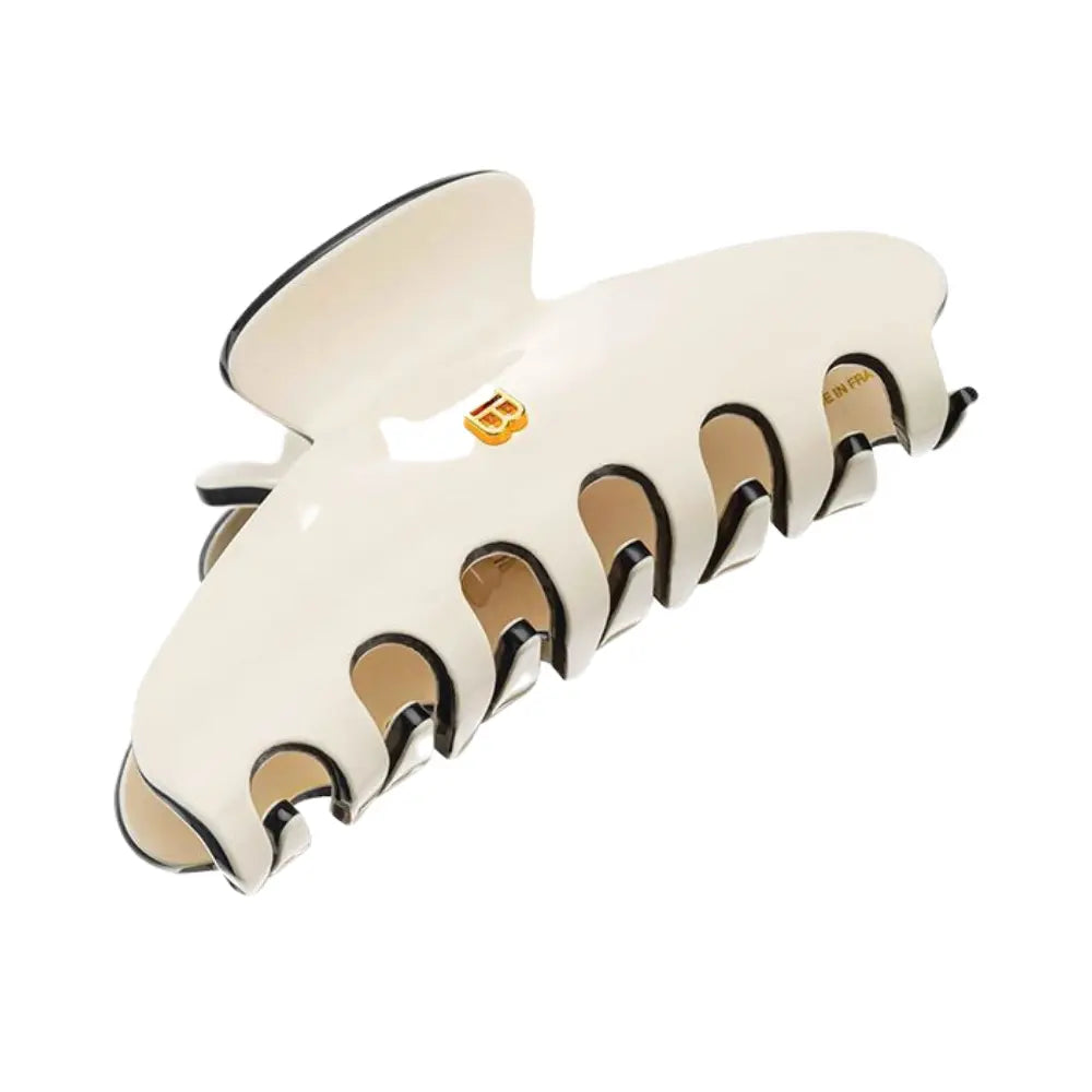 Buy Balmain Hair Pinch Clip Large / Ivory & Black / Limited Edition SS23 Hair Clips Lift your hair styling to the next level with the Balmain Hair Pinch Clip Large in Black & Ivory, an exquisite accessory from the limited-edition SS23 collection. This isn