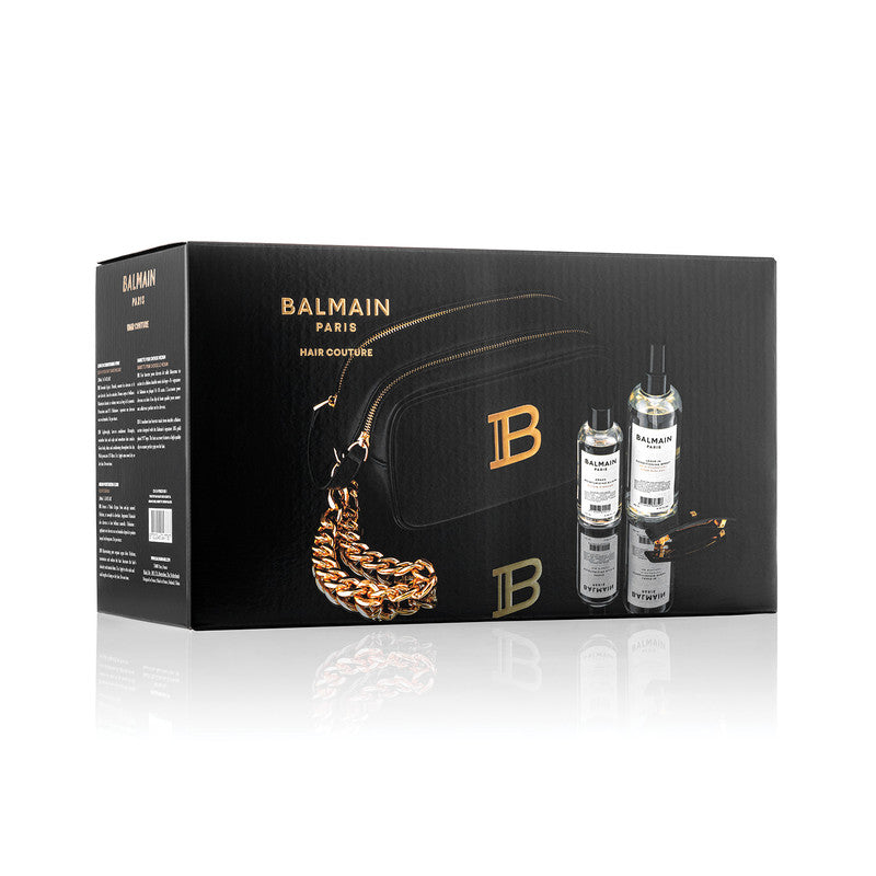Balmain Black Pouch Fw22 Signature vegan leather pouch embellished with golden logo plaque. Perfect to store all hair care essentials. Including the bestselling Signature Foundation duo to create the perfect styling base for any hairstyle and a Barrette p