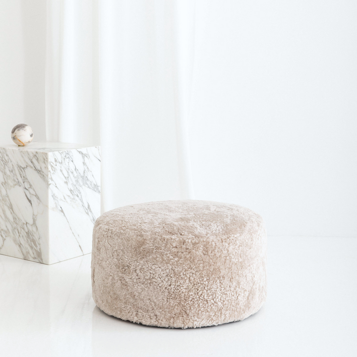 Buy and Save on The Jamieson Ottoman - Bone Ottomans | Bring natural texture and contemporary design into your space with the sturdy and stylish handmade Jamieson Round Ottoman. Choose between two sizes and three beautiful modern colours, or mix-and-match