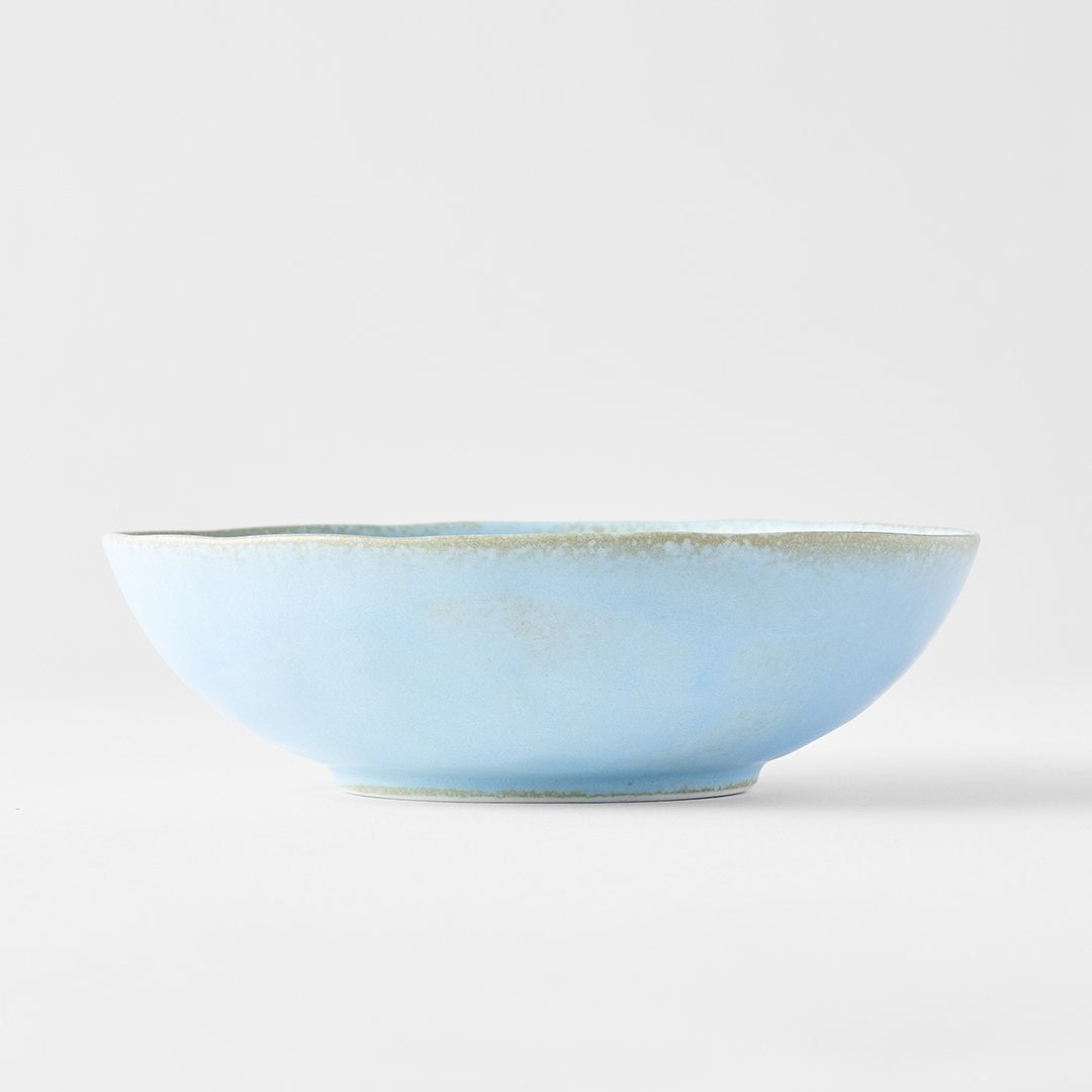 Save on Soda Blue Medium Open Oval Bowl Made in Japan at BEON. 17cm x 15cm diameter x 5cm height. Open oval bowl in Soda Blue design The Soda Blue range features a soft pastel blue, highlighted by a gentle play of white. Each piece has a unique pattern determined by its position in the kiln during the firing process. This beautiful open oval bowl is perfect for everyday use or bring out on special occasions. Handcrafted in JapanMicrowave and dishwasher safe.