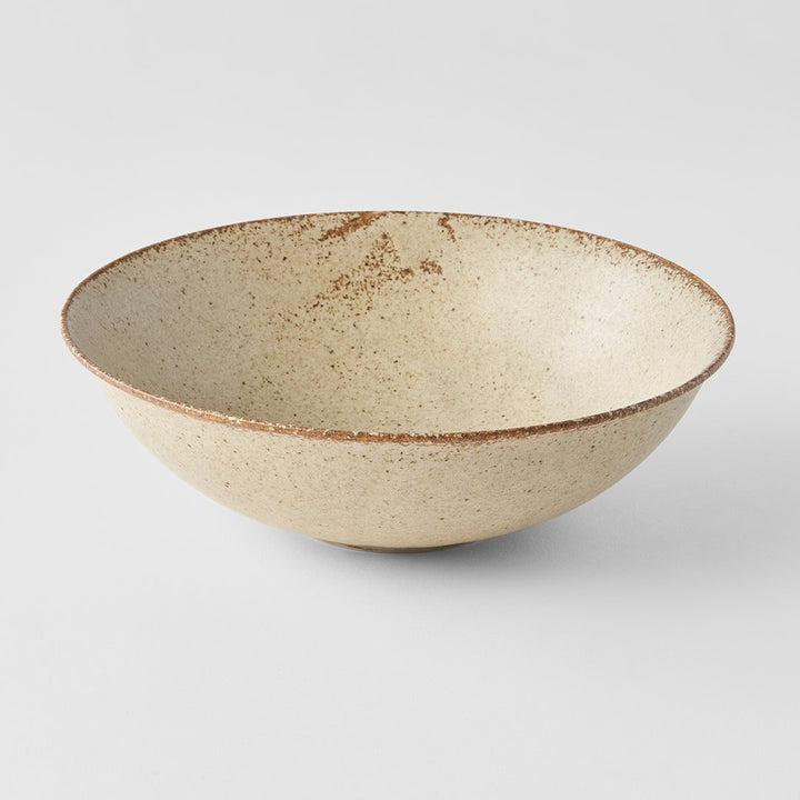 Save on Sand Fade Open Bowl Made in Japan at BEON. 22cm diameter x 6cm height Open bowl in Sand Fade design. The Sand Fade Glaze features a warm, sandy tone with touches of hazel brown. Each piece has a unique speckled pattern determined by its position in the kiln during the firing process. This bowl is perfect to serve salads or to use for curries, noodles and risottos. Handcrafted in JapanMicrowave and dishwasher safe