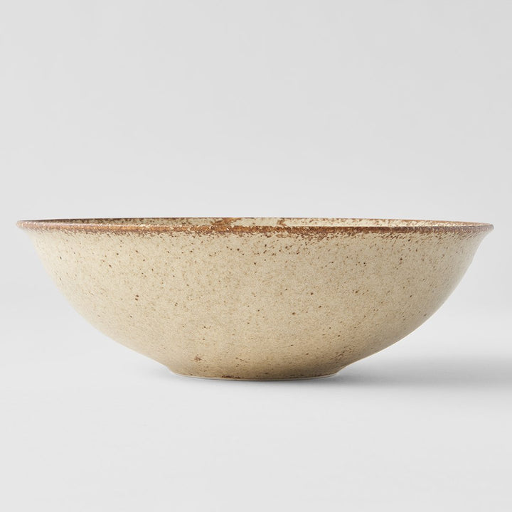 Save on Sand Fade Open Bowl Made in Japan at BEON. 22cm diameter x 6cm height Open bowl in Sand Fade design. The Sand Fade Glaze features a warm, sandy tone with touches of hazel brown. Each piece has a unique speckled pattern determined by its position in the kiln during the firing process. This bowl is perfect to serve salads or to use for curries, noodles and risottos. Handcrafted in JapanMicrowave and dishwasher safe