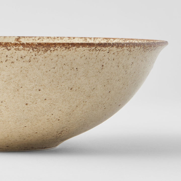 Save on Sand Fade Open Bowl Made in Japan at BEON. 22cm diameter x 6cm height Open bowl in Sand Fade design. The Sand Fade Glaze features a warm, sandy tone with touches of hazel brown. Each piece has a unique speckled pattern determined by its position in the kiln during the firing process. This bowl is perfect to serve salads or to use for curries, noodles and risottos. Handcrafted in JapanMicrowave and dishwasher safe